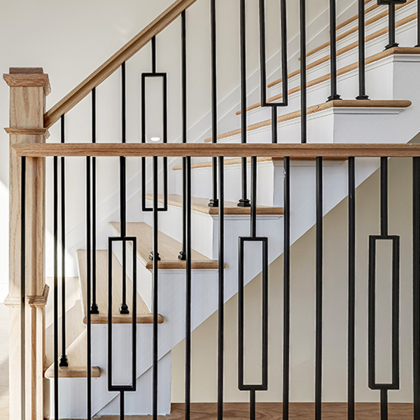 rectangle iron balusters with craftsman box newel on a staircase